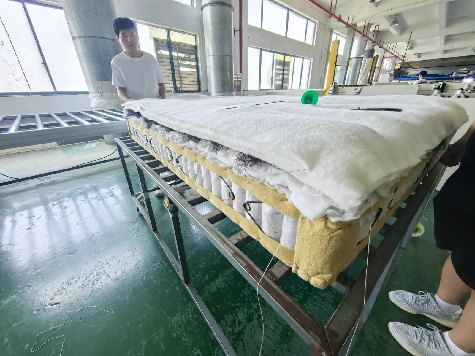 Mattress layers being assembled on the production line